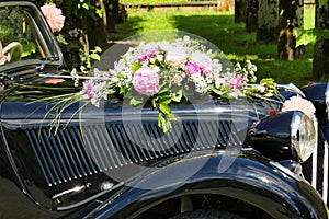 Wedding bouquet on automobile