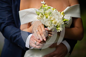 Wedding bouquet of the bride in hand