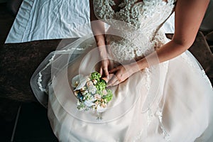 Wedding bouquet of the bride in hand