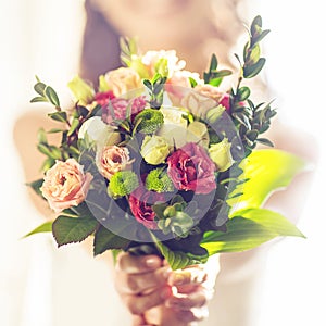 Wedding bouquet in bride's hands