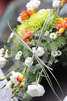 Wedding bouquet on car