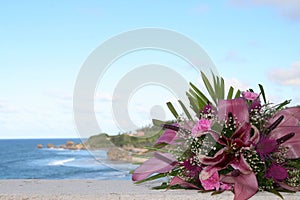 Wedding bouquet and coastline