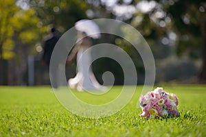 Wedding bouquet & a couple