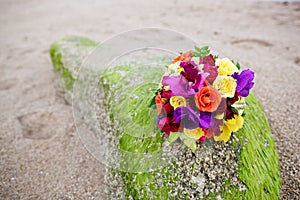 Wedding bouquet flower on beautiful sand beach