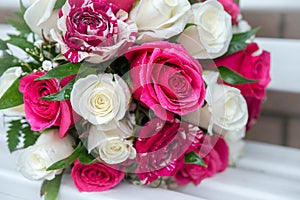 Wedding bouquet of fresh roses on white background, close up.