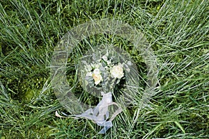 Wedding bouquet of green and white flowers