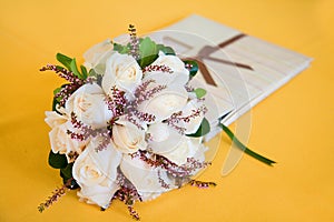 Wedding bouquet and guest book photo