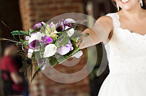 Wedding bouquet in hands of the bride