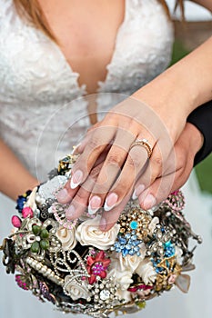 wedding bouquet hands holding hand manicure weddings marriage ceremony reception flowers floral love couple married celebration