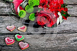 Wedding Bouquet with Heart shape Gingerbread on wood