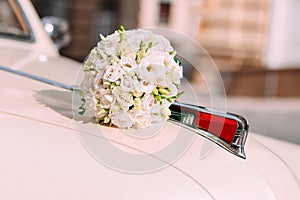 wedding bouquet hood white retro car outside