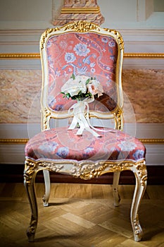 Wedding bouquet lying on chair