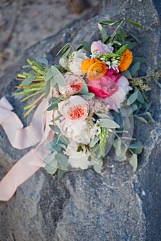 Wedding bouquet with peony, ranunculus, rose