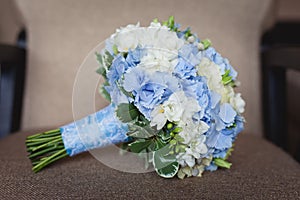 Wedding bouquet with pretty blue flowers