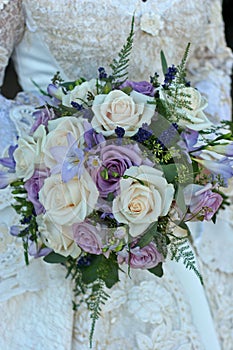 Wedding Bouquet of purple and white roses