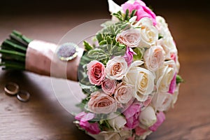Wedding bouquet and rings. The concept of marriage and love. accessories marriage closeup