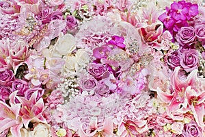 wedding bouquet with rose bush, Ranunculus asiaticus as a background