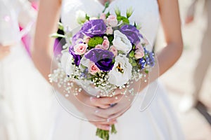 Wedding bouquet with roses and alstromeria