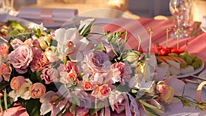 Wedding bouquet of roses. Bride`s bouquet on wedding day. Bouquet of different flowers. Bouquet of beautiful pink and