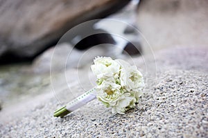 Wedding bouquet on tropical beach