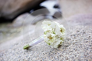 Wedding bouquet on tropical beach