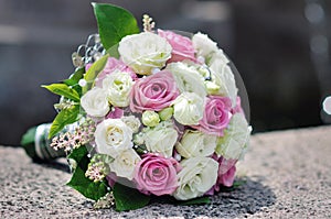 Wedding bouquet with two golden rings