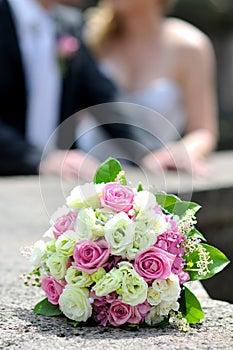 Wedding bouquet with two golden rings