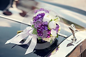 Wedding Bouquet on a wedding car