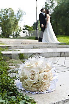 Wedding bouquet with the wedding couple