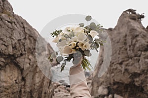 Wedding bouquet of white callas. Wedding floristry.