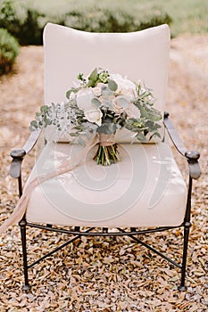 Wedding bouquet with white peonies for rustic wedding