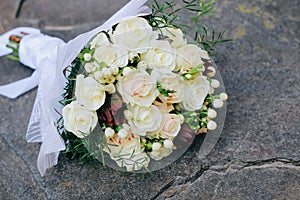 Wedding bouquet of white roses, white berries