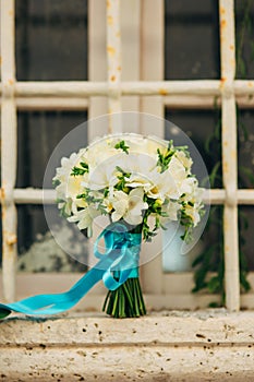 Wedding bouquet on a window