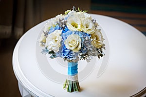 Wedding bouquet of yellow roses and other flowers