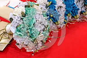 wedding bouquetes on red background. photo