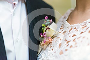 Wedding boutonniere in suit pocket.