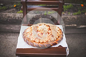 Wedding bread from wheat flour dough on the plate