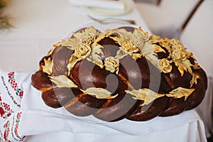 Wedding bread from wheat flour dough on the plate