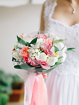 Wedding bridal bouquet in bride`s hands