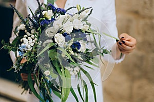Wedding bridal bouquet of roses, lisianthus, lavender, Gypsophil