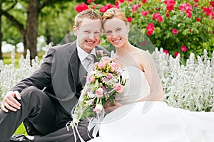 Wedding - bride and groom in a park