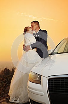 Wedding. Bride and Groom at sunset