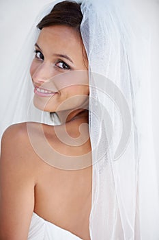 Wedding, bride and portrait with veil, makeup and fashion for celebration of marriage. Bridal, aesthetic and back of