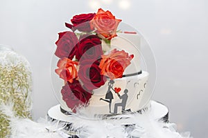 Wedding cake on the bride`s desk