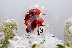 Wedding cake on the bride`s desk