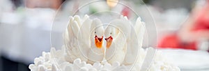 Wedding cake decorated with swans