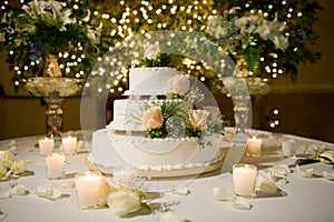 Wedding cake on the decorated table