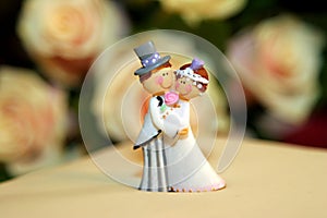 Wedding cake dolls closeup