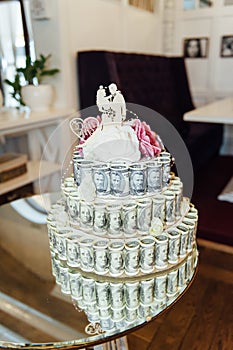 Wedding cake made of money, treasure chest