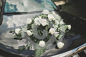 Wedding car decorated with beautiful, luxury flowers